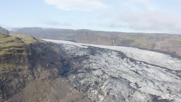 Aerial View Of The Solheimajokull Glacier In South Iceland - drone shot alt