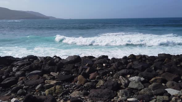 Gran Canaria Beach with Waves Crashing Through Rocks alt