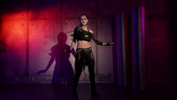 Female Dancer is Dancing Alone in Dark Studio Moving Her Body Sexually alt