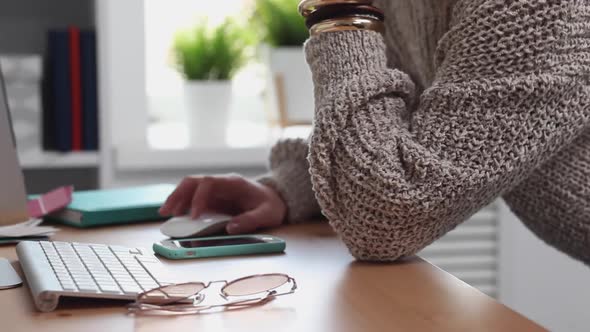 Young Woman Dances in her Home Office alt