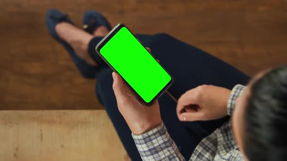 Woman using smartphone alt