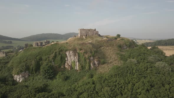 Dramatic Rocky Outcrop Of Dunamase Castle Against Agricultural Landscape At County Laois In Dunamais alt