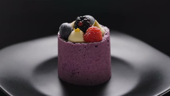 Delicious cake with blueberry mousse and fresh blueberry