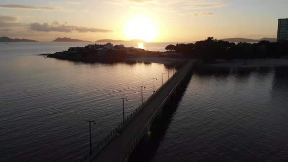 dramatic aerial sunset over Puente de Toralla and Isla de Toralla (Bridge and Toralla Island) City o alt