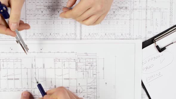 Builders Make Amendments To This Drawing of the New Building. Close Up alt