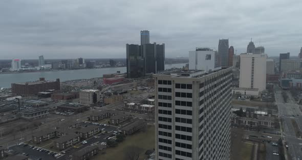 Aerial view of downtown Detroit and surrounding neighborhood on a cloudy and gloomy day. This video alt
