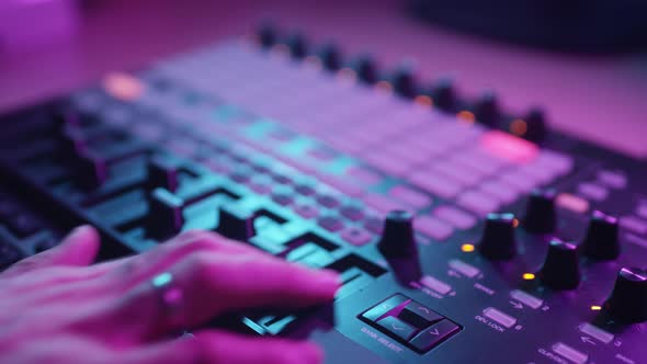 Editing Director or TV Producer Mixing Video Cameras in a Studio on a Mixing Console alt