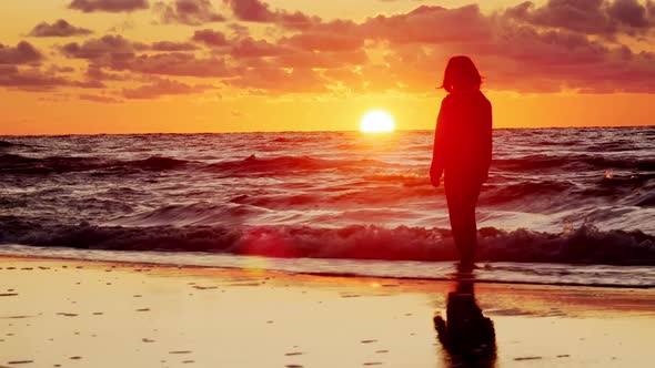 Two Girls on Beach at Sunset.