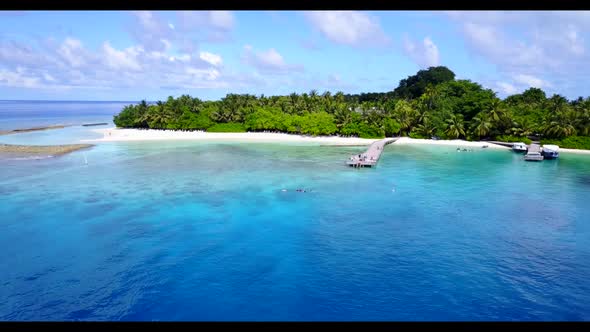 Aerial flying over travel of marine shore beach journey by blue sea with white sand background of a  alt