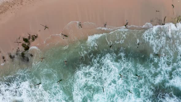 Aerial View of the Fishermen Sitting on Their Shelves and Fishing During Sunset the Southern Part of