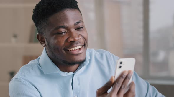 Happy Young African American Guy Businessman Handsome Entrepreneur Man Worker Hold Smartphone Talk alt