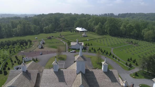 Aerial View of Old Restored Barns on a Spring Day alt