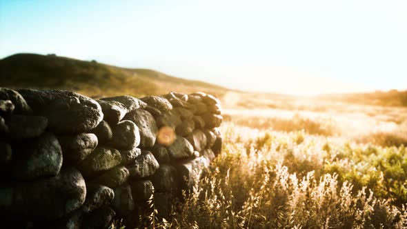 Scottish Land Border Stone Wall at Sunset alt