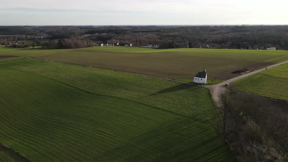 Aerial View of Small Rural Chapel Located in Bousval Belgiium alt
