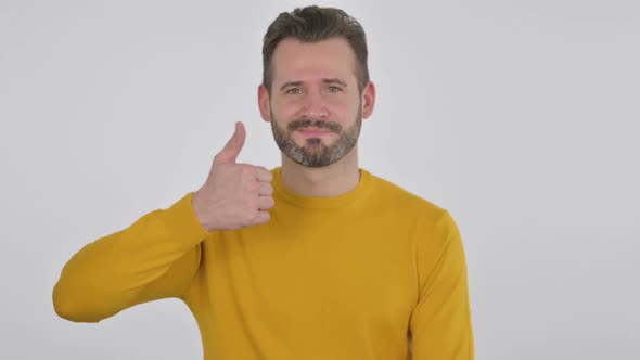 Portrait of Middle Aged Man Showing Thumbs Up Sign alt