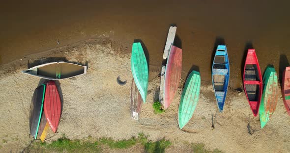 Aerial View of the Lake Shore with Colored Boats