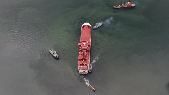 Tugs Mooring the Ferry That Arrived at the Port for Completion at the Shipyard alt
