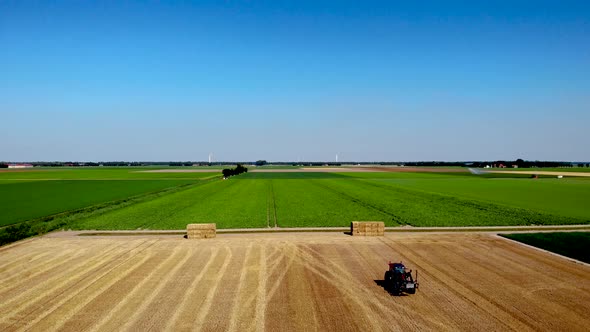 Harvesting Machinetractor Working in the Field alt