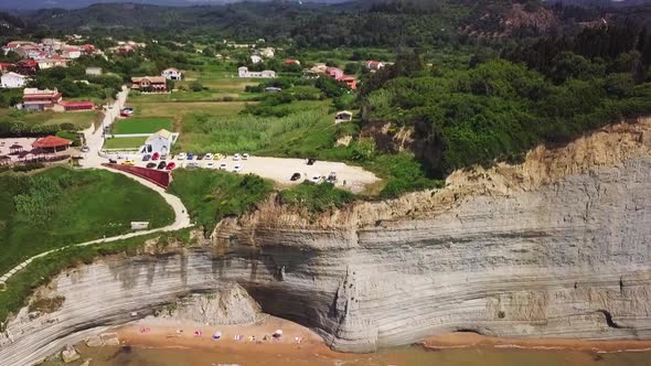Greece, Corfu Island, drone footage of a beautiful cliff. Backwards flight. alt