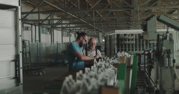 The Manager and Technological Engineer Check Plastic Window Frame with Calipers alt