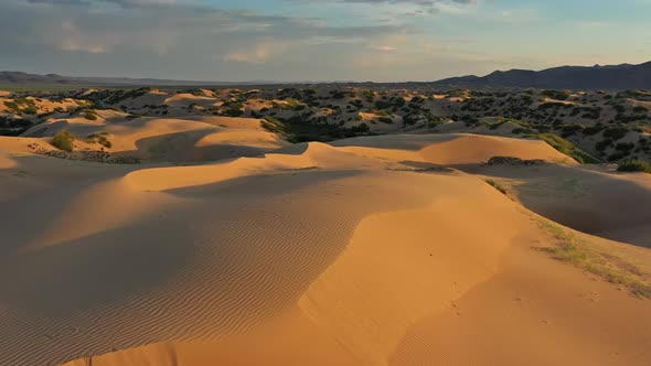 Aerial View of the Sand Dunes at Sunrise alt