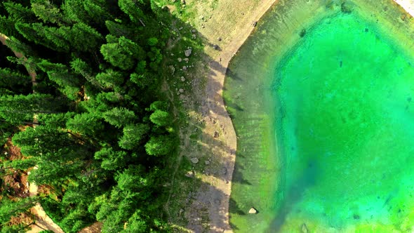 Top view of Mountain Carezza lake, Dolomites, Italy alt