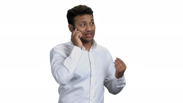 Businessman Explaining Something on the Futuristic Phone alt