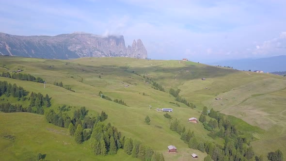 Aerial travel drone view of South Tyrol, Italy and the Dolomites mountains. alt