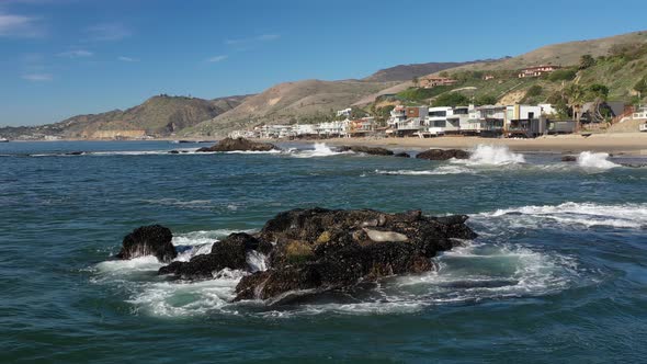 devastating and spectacular sea storm - sea waves crash on the rocks of the coast creating an explos alt