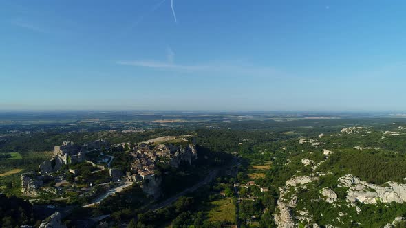 Village of Les Baux-de-Provence in Bouches-du-Rhone in France from the sky alt