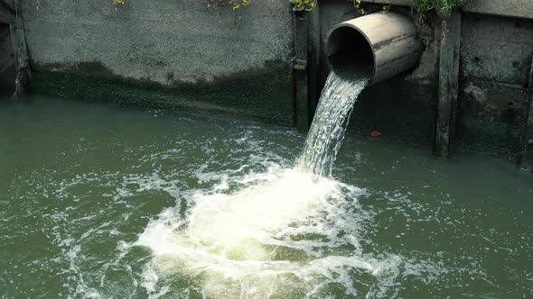 Rainwater Flows Into the Canal Through the City Sewer System alt