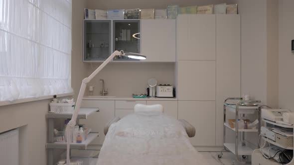A Sterile Plastic Surgeon's Office with a Surgical Chair