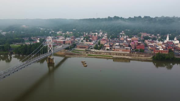 Maysville, Kentucky historic downtown along the Ohio River with the Simon Kenton Memorial Bridge alt