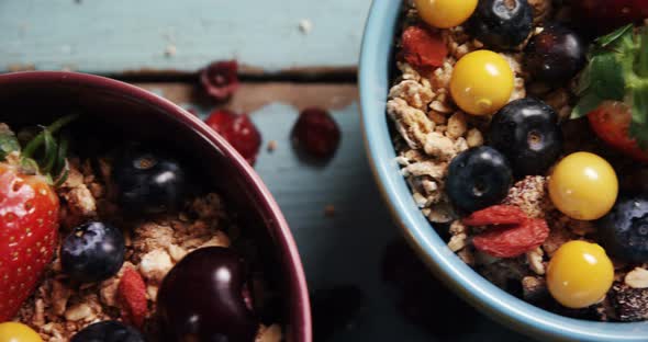 Healthy breakfast in a bowl on a table alt