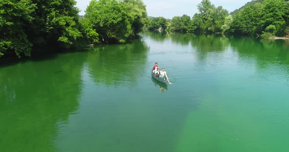 Man Cycling on the Machine Trainer He is Exercising in the Home alt