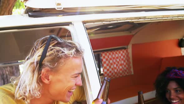 Friends having fun in camper van 4k alt