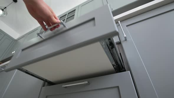 Pulling Out and Closing the Drawer at Modern Classic Gray Kitchen
