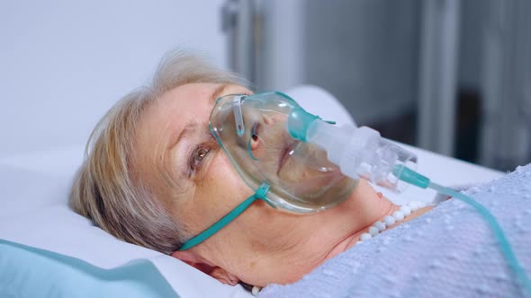 Senior Woman Breathing Slowly with Oxygen Mask, Stock Footage | VideoHive