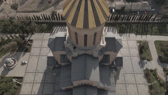 Aerial view of Holy Trinity Cathedral Sameba in Tbilisi Georgia. Sunrise drone footage 2021 alt