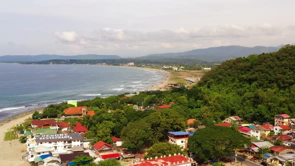 San Juan, La Union, Philippines. Sea Coast with Beach and Hotels, Top View. alt