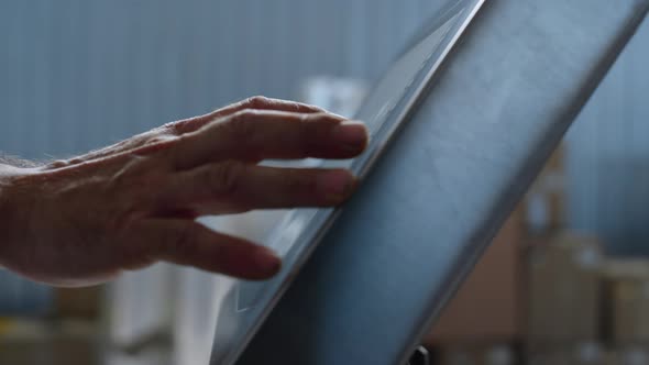 Factory Worker Typing on Scales Calculating Weight of Production Hands Closeup alt
