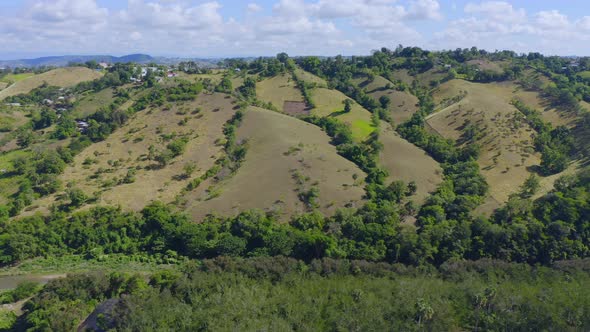 El Camito countryside near Bao dam in Dominican Republic. Aerial sideways alt