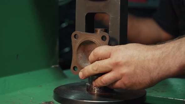 A Locksmith Repairing a Gimbal alt