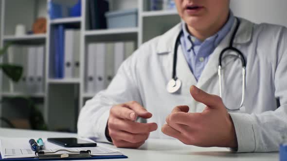 Doctor Man Explains Conducts A Consultation Conducts A Conversation With A Patient, A Medic alt