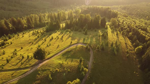 Aerial view of beautiful mountain Carpathians, Ukraine in sunlight. Drone filmed an landscape 