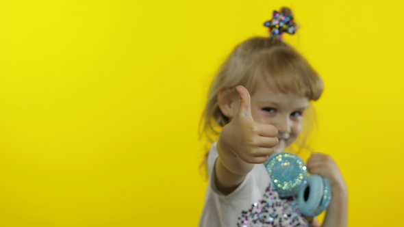 Child Dances, Listens Music, Little Kid Girl with Headphones Dancing, Having Hun, Relaxing, Enjoying alt