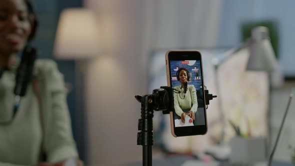 Social Media Woman Talking at Professional Microphone Recording alt