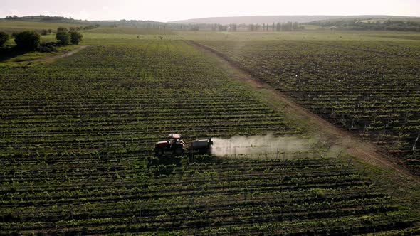 Spraying chemical insecticide or fertilizers, agricultural spring works. alt
