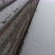 Moving along brick wall and snow-covered path. - VideoHive Item for Sale