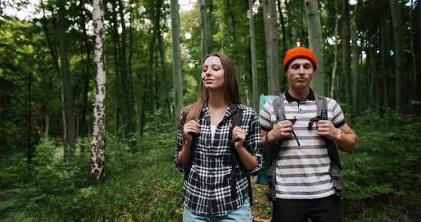 Amazed Tourists in Forest